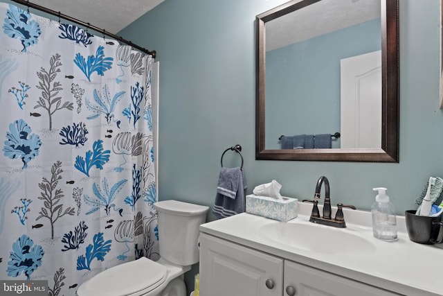 11721 Hoover Ln, Fredericksburg, VA 22407 - full bathroom featuring a textured ceiling, vanity, and curtained shower
