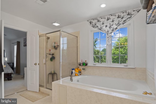 11721 Hoover Ln, Fredericksburg, VA 22407 - ensuite bathroom featuring a stall shower, a garden tub, and tile patterned floors