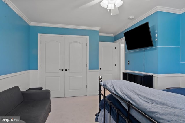 11721 Hoover Ln, Fredericksburg, VA 22407 - bedroom with a closet, carpet, ornamental molding, ceiling fan, and wainscoting