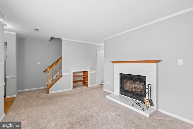 11260 Girven Ct, Fredericksburg, VA 22407 - unfurnished living room with a fireplace, carpet floors, stairway, and ornamental molding