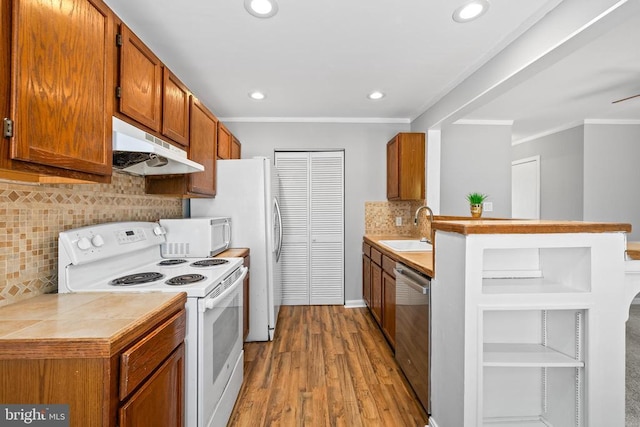 11260 Girven Ct, Fredericksburg, VA 22407 - kitchen featuring white appliances, under cabinet range hood, ornamental molding, tasteful backsplash, and wood finished floors