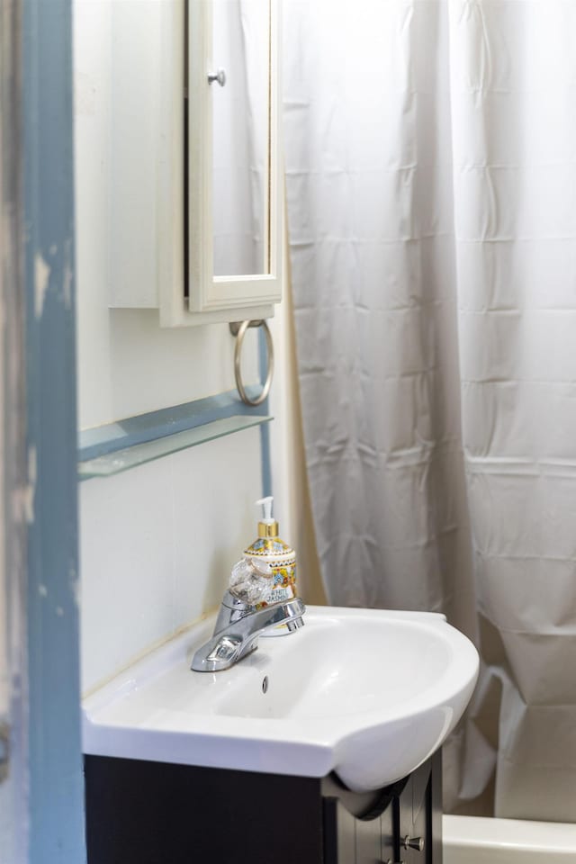 143 Pkin Ln, Raphine, VA 24472 - full bath with a shower with curtain and vanity