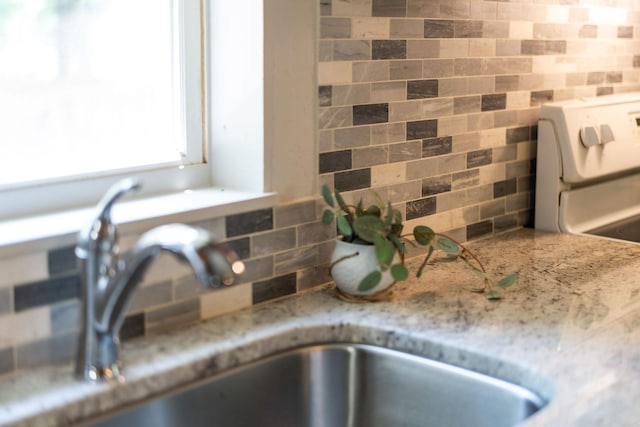 143 Pkin Ln, Raphine, VA 24472 - detailed view of decorative backsplash and light stone counters