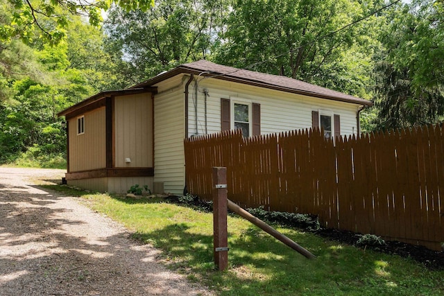 143 Pkin Ln, Raphine, VA 24472 - view of side of home with a shingled roof and gravel driveway