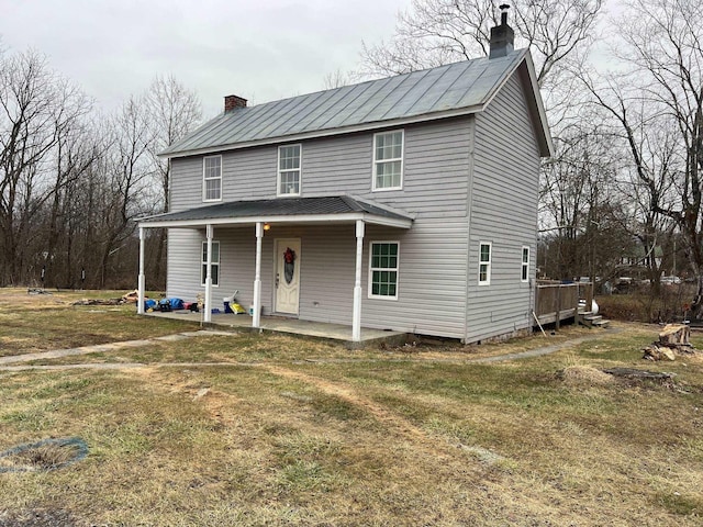 3090 Deerfield Valley Rd, Deerfield, VA 24432 - view of front of home featuring a chimney, metal roof, a porch, and a front yard