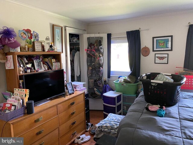  - bedroom with ornamental molding
