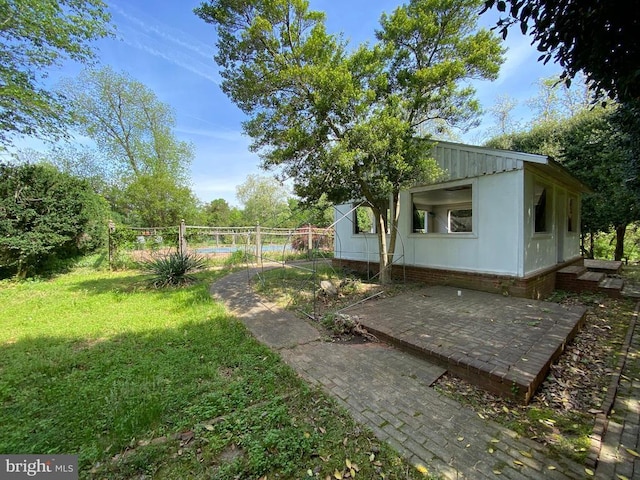  - view of yard with a patio