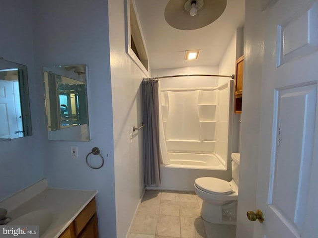  - full bath with vanity, toilet, shower / bath combo, tile patterned floors, and baseboards