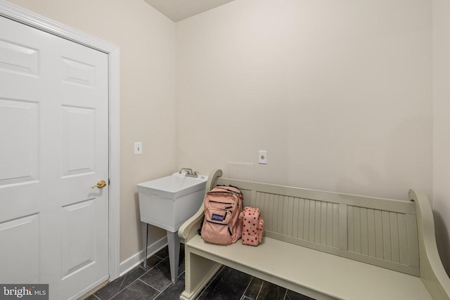 bathroom with baseboards