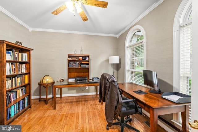 office with hardwood / wood-style flooring, ceiling fan, crown molding, and baseboards