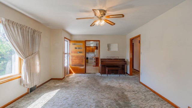 338 Fairfax Ave, Elkton, VA 22827 - carpeted living room with ceiling fan and baseboards