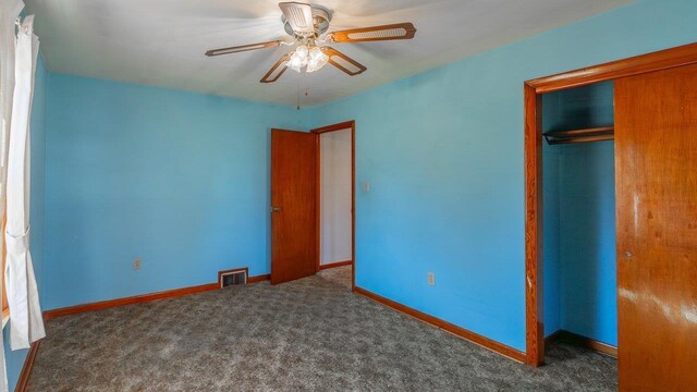 338 Fairfax Ave, Elkton, VA 22827 - unfurnished bedroom with carpet floors, a closet, baseboards, and a ceiling fan