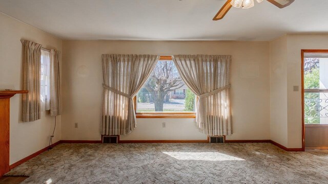 338 Fairfax Ave, Elkton, VA 22827 - unfurnished room featuring carpet flooring, ceiling fan, and baseboards