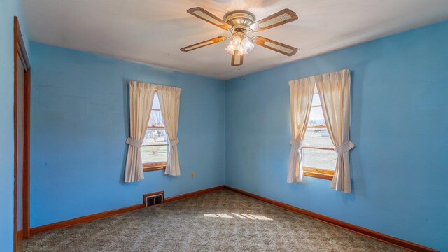 338 Fairfax Ave, Elkton, VA 22827 - empty room with plenty of natural light, carpet floors, baseboards, and a ceiling fan