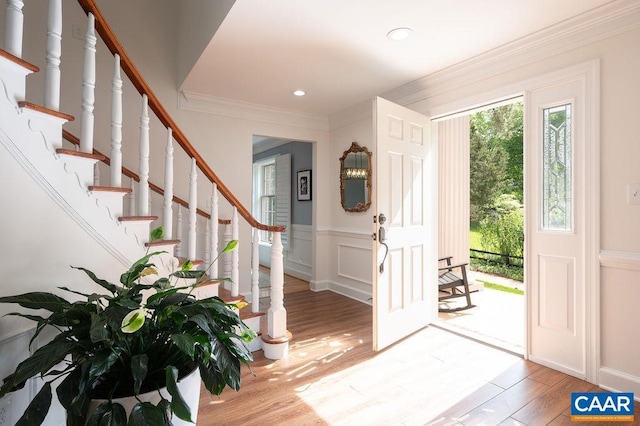 25 Bolling Cir, Palmyra, VA 22963 - foyer entrance featuring crown molding, wood finished floors, stairs, wainscoting, and recessed lighting