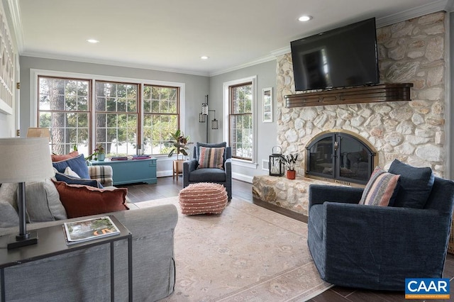 25 Bolling Cir, Palmyra, VA 22963 - living room with a stone fireplace, wood finished floors, crown molding, recessed lighting, and baseboards