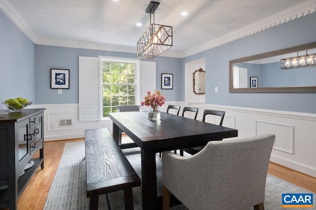 25 Bolling Cir, Palmyra, VA 22963 - dining area with wainscoting, a chandelier, crown molding, light wood-type flooring, and recessed lighting