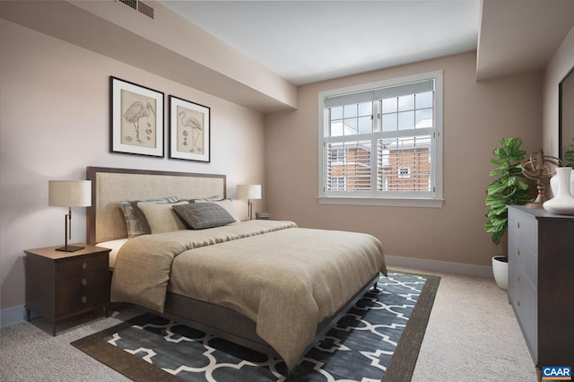 217 E Jefferson St, Charlottesville, VA 22902 - carpeted bedroom featuring baseboards