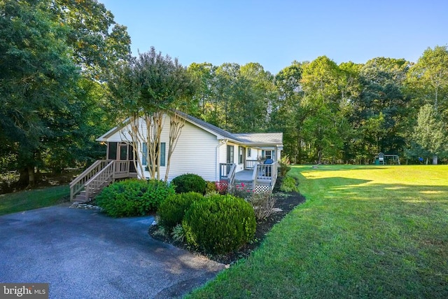 15605 Cedar Tree Ct, Mineral, VA 23117 - view of property exterior with a porch and a yard
