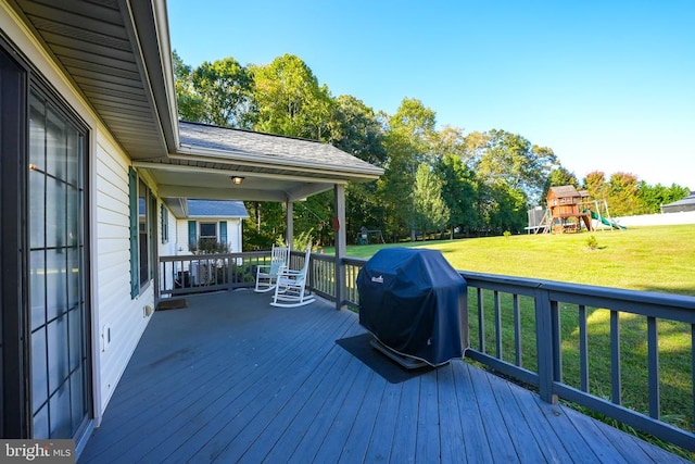 15605 Cedar Tree Ct, Mineral, VA 23117 - deck featuring a grill, a lawn, and a playground