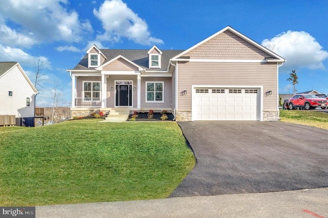 573 Sunset Loop, Mineral, VA 23117 - craftsman-style home featuring asphalt driveway, an attached garage, a front yard, covered porch, and stone siding