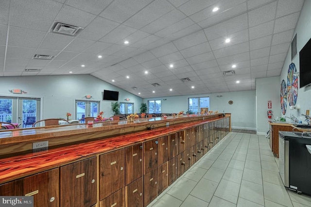 573 Sunset Loop, Mineral, VA 23117 - miscellaneous room featuring light tile patterned floors and vaulted ceiling