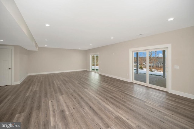 573 Sunset Loop, Mineral, VA 23117 - unfurnished living room with wood finished floors and recessed lighting