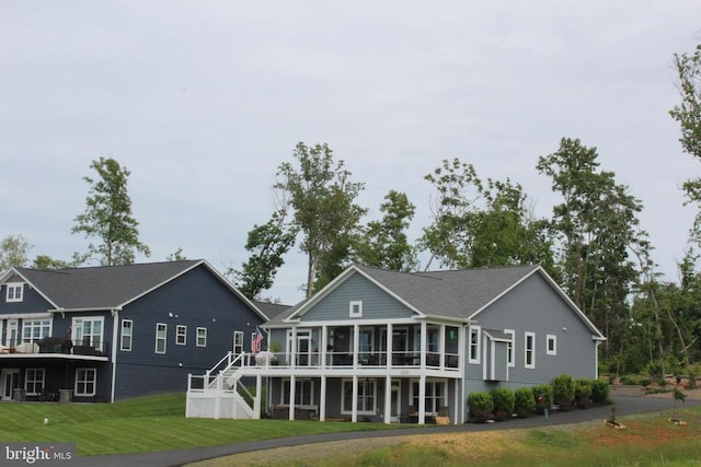 573 Sunset Loop, Mineral, VA 23117 - back of property with a yard, stairway, a wooden deck, and a sunroom