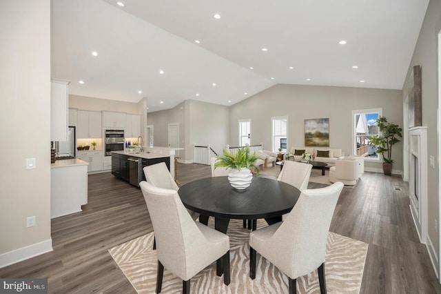 573 Sunset Loop, Mineral, VA 23117 - dining space featuring recessed lighting, dark wood-style floors, and high vaulted ceiling
