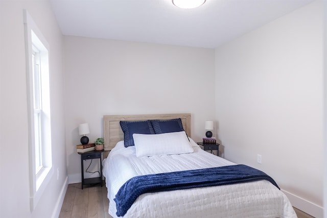 519 Arpia St, Lexington, VA 24450 - bedroom with baseboards and wood finished floors