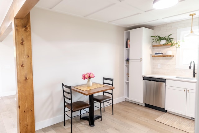 519 Arpia St, Lexington, VA 24450 - kitchen with dishwasher, a sink, open shelves, light countertops, and white cabinetry