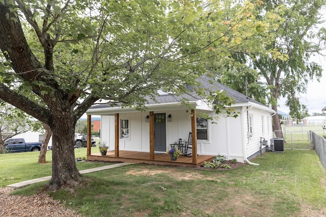 519 Arpia St, Lexington, VA 24450 - view of front of home with central air condition unit, board and batten siding, a porch, and roof with shingles