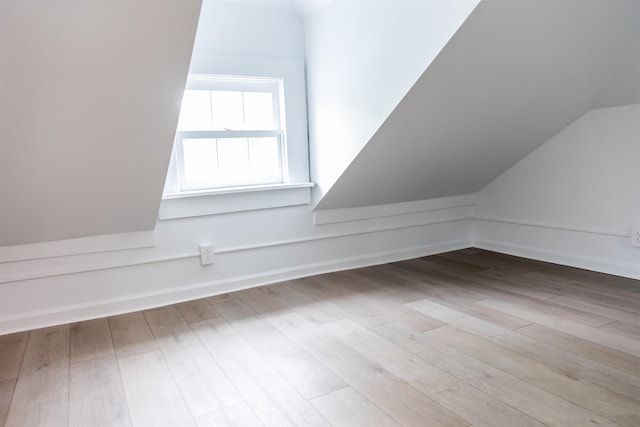 519 Arpia St, Lexington, VA 24450 - additional living space with vaulted ceiling, wood finished floors, and baseboards