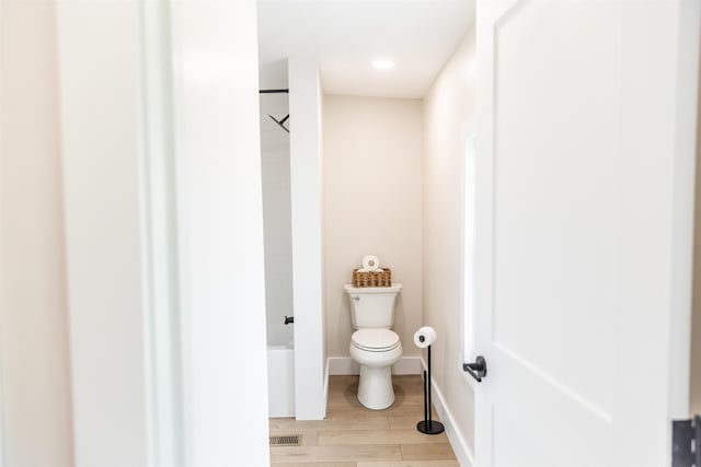 519 Arpia St, Lexington, VA 24450 - full bathroom with toilet, shower / bath combination, and wood finished floors