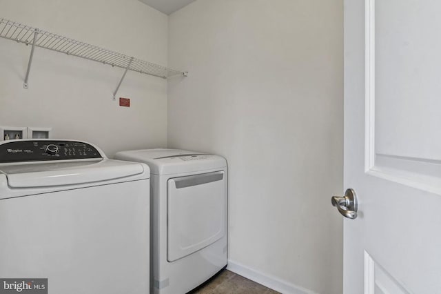 9105 Wild Spruce Dr, Fredericksburg, VA 22407 - washroom featuring separate washer and dryer and baseboards