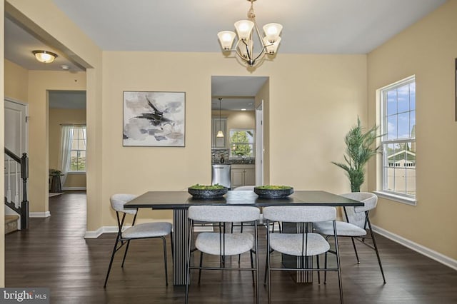 9105 Wild Spruce Dr, Fredericksburg, VA 22407 - dining room featuring stairs, healthy amount of natural light, baseboards, and dark wood-type flooring