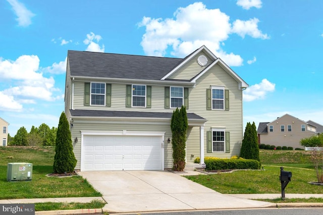 9105 Wild Spruce Dr, Fredericksburg, VA 22407 - traditional-style house with concrete driveway, an attached garage, and a front yard