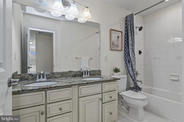 9105 Wild Spruce Dr, Fredericksburg, VA 22407 - full bath with tile patterned flooring, double vanity, toilet, and shower / tub combo