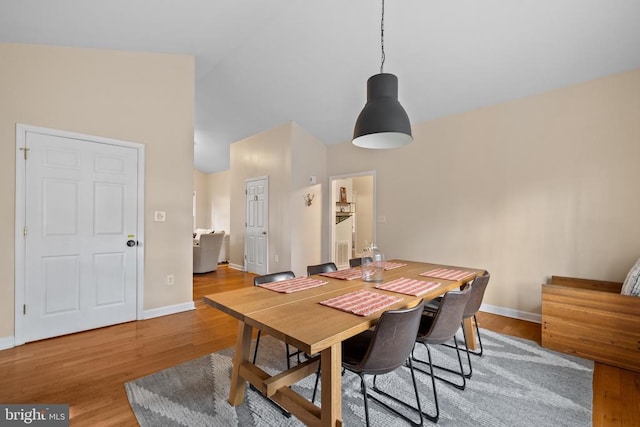 6005 Page Valley Rd, Luray, VA 22835 - dining space featuring light wood-style floors, baseboards, and lofted ceiling