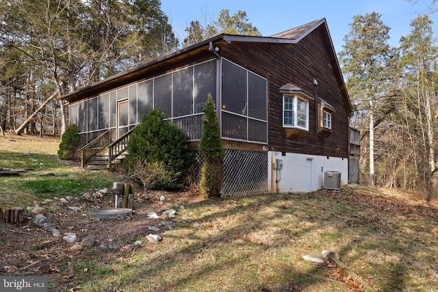 6005 Page Valley Rd, Luray, VA 22835 - view of side of property with a sunroom, central air condition unit, and a lawn