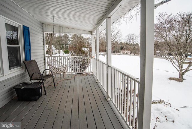 view of snow covered garage