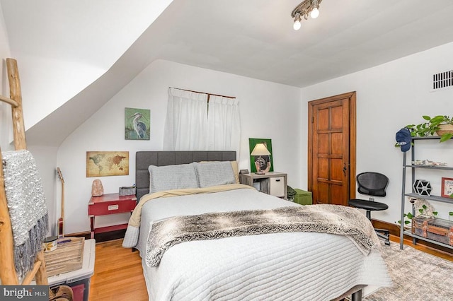 bedroom featuring light wood-type flooring