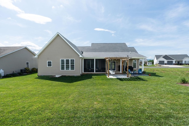193 Locust Grove Ln, Stuarts Draft, VA 24477 - rear view of property featuring a patio, a lawn, and a shingled roof