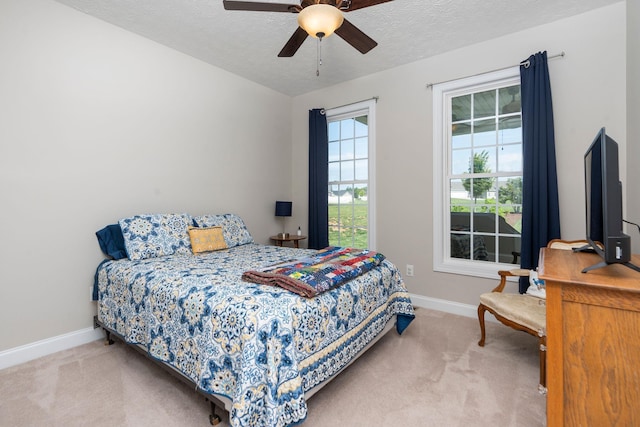 193 Locust Grove Ln, Stuarts Draft, VA 24477 - carpeted bedroom with a textured ceiling and a ceiling fan