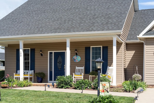 193 Locust Grove Ln, Stuarts Draft, VA 24477 - view of exterior entry with a porch and a shingled roof