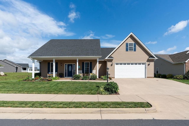 193 Locust Grove Ln, Stuarts Draft, VA 24477 - traditional home with concrete driveway, a front lawn, a porch, and a garage
