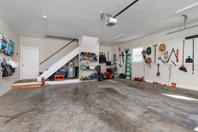 193 Locust Grove Ln, Stuarts Draft, VA 24477 - garage featuring a garage door opener and electric water heater