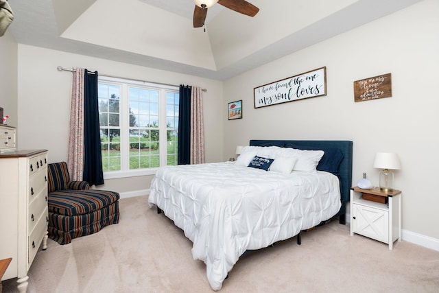 193 Locust Grove Ln, Stuarts Draft, VA 24477 - bedroom with light colored carpet, a tray ceiling, and a ceiling fan
