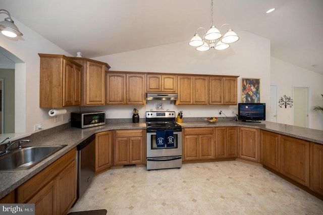 kitchen featuring appliances with stainless steel finishes, a sink, brown cabinetry, a chandelier, and light flooring
