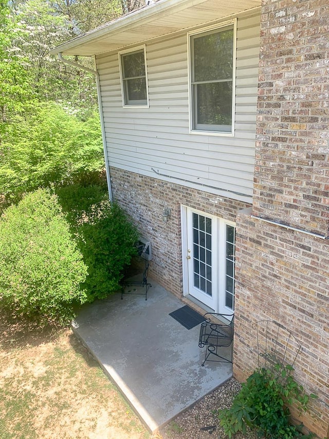 209 Raintree Rd, Verona, VA 24482 - rear view of house with a patio area and brick siding